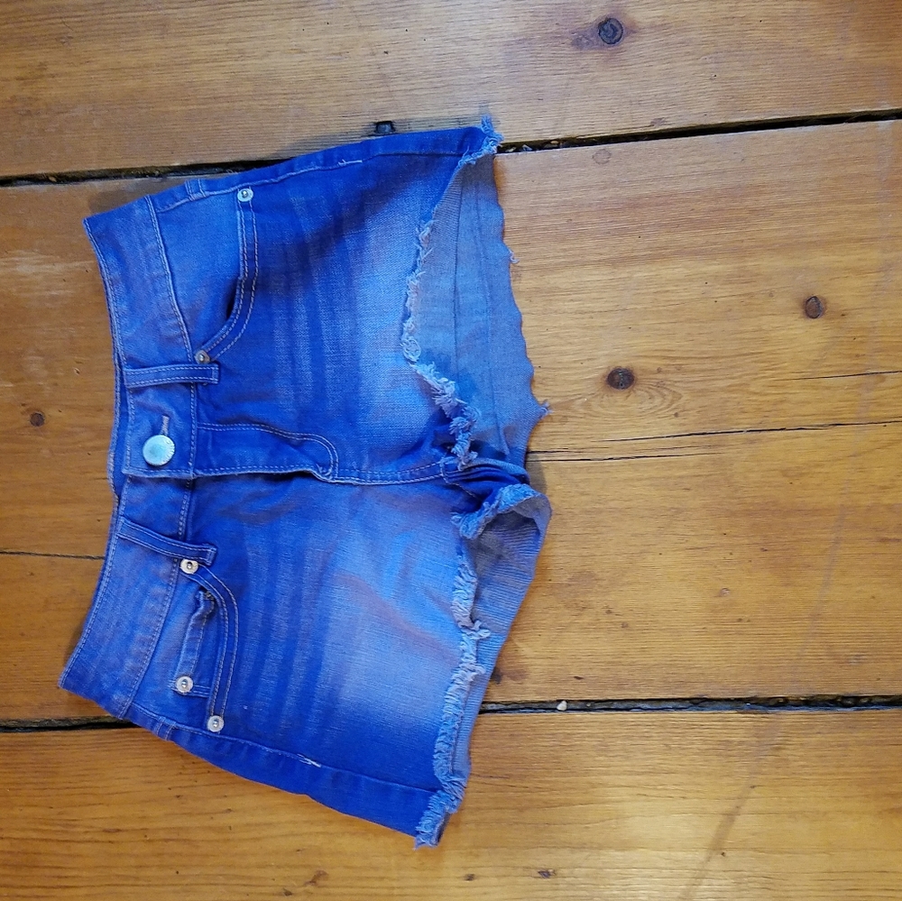 I am selling a navy blue pair of shorts.